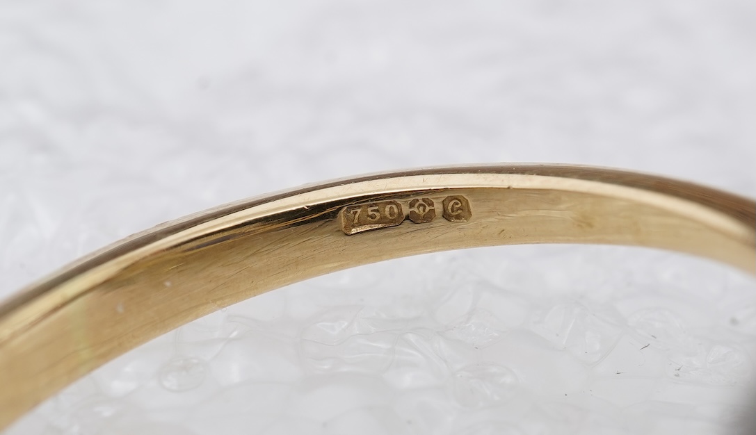 A sapphire and diamond cluster ring